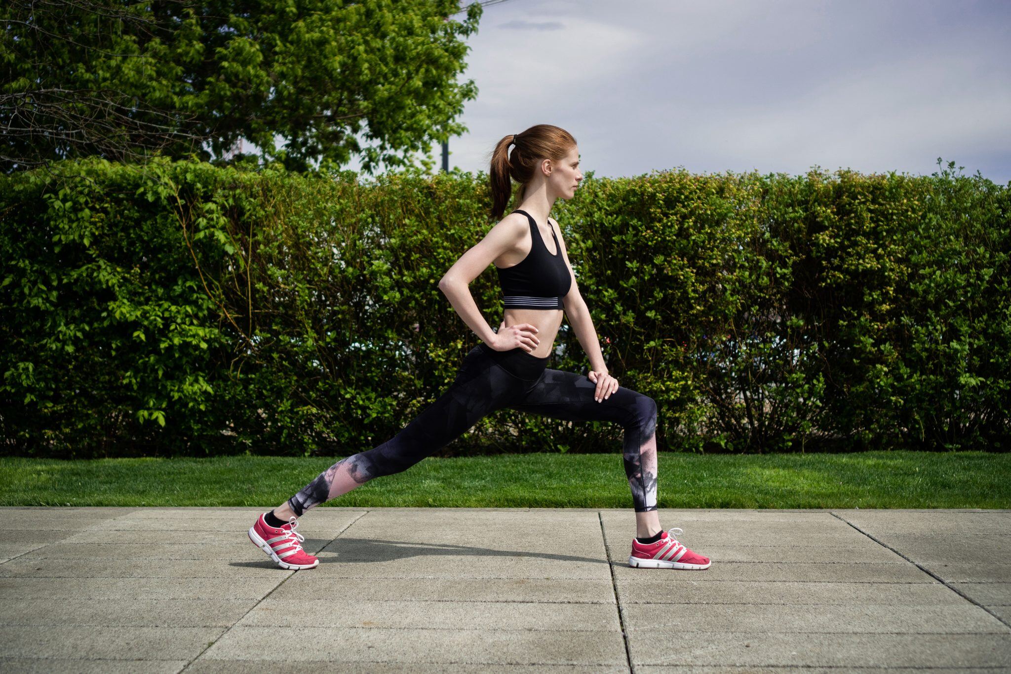 young-woman-doing-a-stretching-exercise-2023-11-27-05-08-26-utc-2048x1365